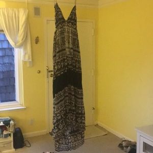 Gauzy black maxi dress with lace detail.